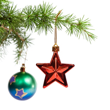 Christmas toys on the Christmas tree. Isolated on white backgroundの写真素材