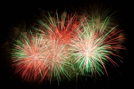 Volleys of beautiful fireworks in the night skyの写真素材