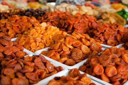 Dried fruits  Different kinds of dried apricot arranged on trays の写真素材