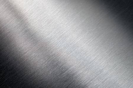 Background of the scratched metal surfaceの写真素材