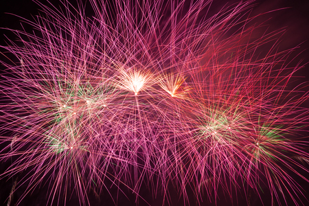 Outbreaks of fireworks in the night skyの写真素材