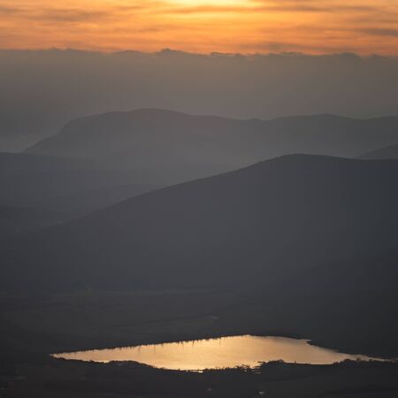 Sunset in the mountain hillsの写真素材