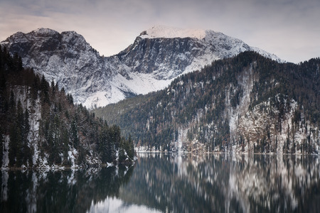 Mountain lake against the backdrop of snow-capped mountains. Rizza Abkhaziaの写真素材