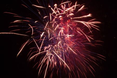 Volleys of fireworks in the night skyの写真素材