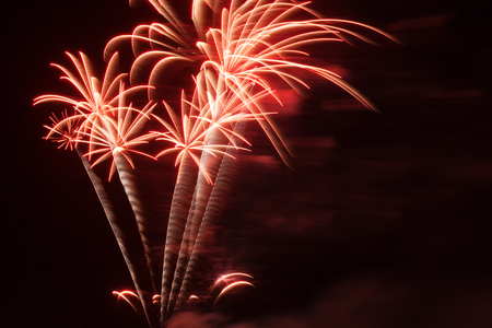Volleys of fireworks in the night skyの写真素材