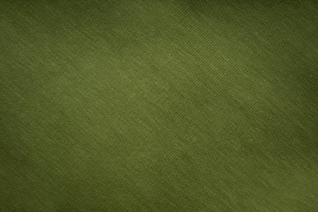 Background of knitted green fabricの写真素材