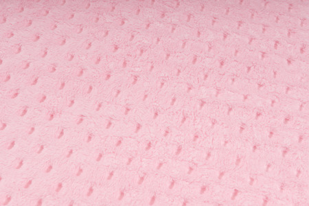 Background of pink knitted fabricの写真素材