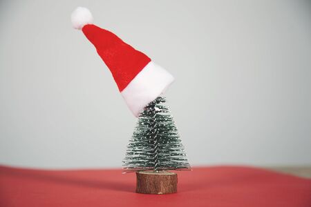 Christmas tree decoration on the red tableの写真素材