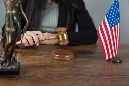 woman hand judge on the wooden desk
