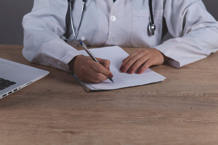 woman doctor hand document on the desk