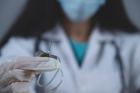 doctor hand syringe with ill on grey background