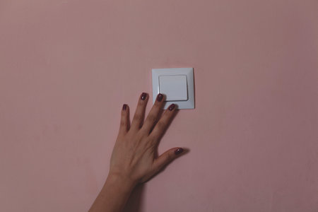woman to turn on the light in home