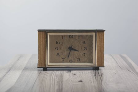 clock on the on gray backgroundの写真素材