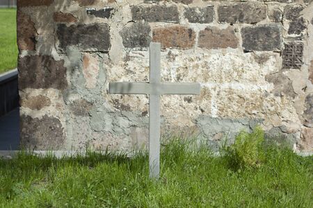 cross of stone in the nature backgroundの写真素材
