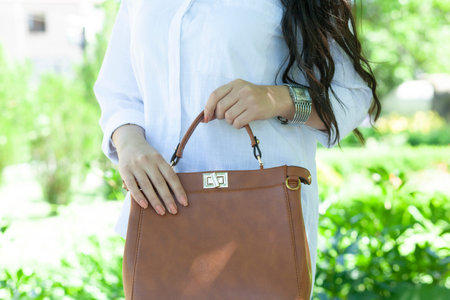 woman hand bag in street