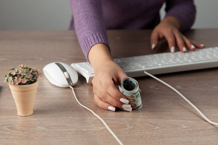 woman hand money in desktop background