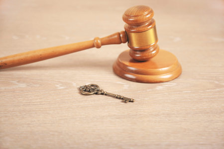 key and judge on the wooden table