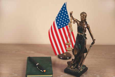 justice lady with judge and american flag on deskの写真素材
