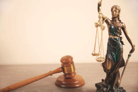 justice lady with judge and american flag on deskの写真素材