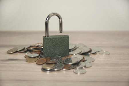 with coins on lock and key