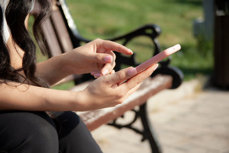woman hand phone on the stairs