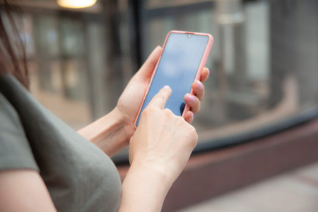 woman hand phone on the stairs