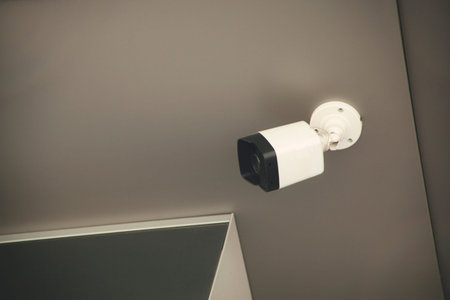 camera in the shop wall backgroundの写真素材