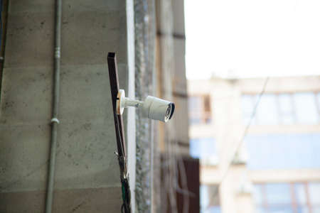 camera in the shop wall backgroundの写真素材