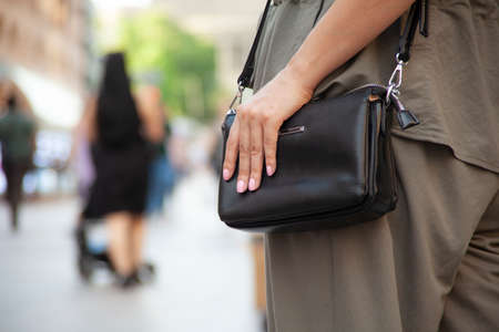 woman hand bag in the streetの写真素材