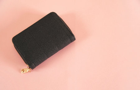 woman wallet on the pink table