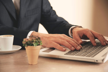 man hand computer keyboard on office desk