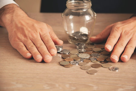 Man putting coin in piggy bank. saving money, finance concept