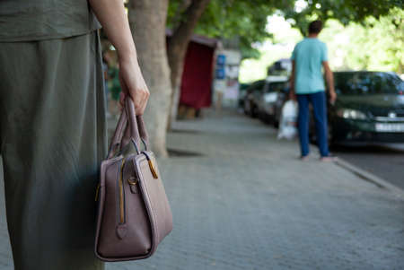 woman hand bag in the streetの写真素材