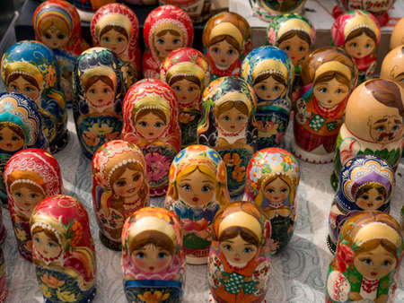 Matrioshka at the street market, iconic popular souvenir from Russia, Ukraine. Colorful bright russian nesting dolls. National present dollの写真素材