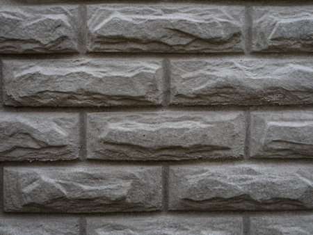 Abstract weathered texture stained old stucco light gray and aged paint white brick wall background...