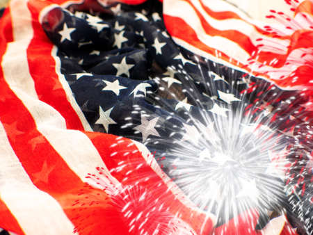 USA flag with fireworks on white background.の写真素材