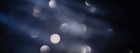 New Year Christmas Blurred background. Abstract defocused gold, white, red and yellow glitters...