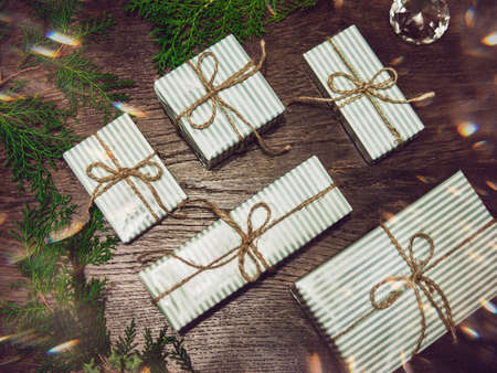 New year gift decoration on wooden board. New Year and Christmas background. Holiday conceptの写真素材