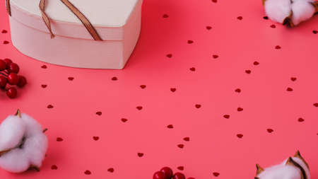 White heart gift box for Valentine's Day on pink background. Flatley. St. Valentine day concept.の写真素材