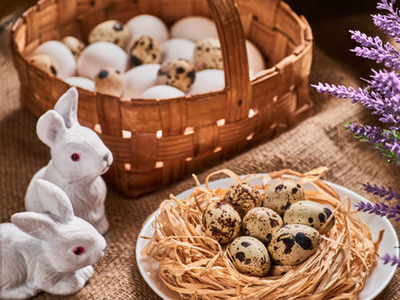 Happy Easter. Congratulations Easter background. Easter eggs, flowers and rabbits.