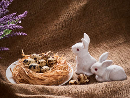 Happy Easter. Congratulations Easter background. Easter eggs, flowers and rabbits.の写真素材