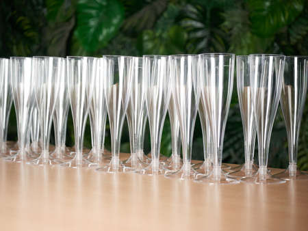 celebration concept, close up of champagne glasses on table, drink, holidaysの写真素材