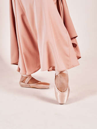 Close up Ballet dancer or classic ballerina dancing isolated on white background. The dance, grace, artist, contemporary, movement, action and motion conceptの写真素材