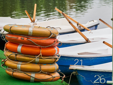 Pier with Lifebuoy and boats . Boat for walking. Boat rental. Relax in the summer. Outdoor...