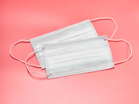 Two Medcine Face masks on black background. Mask to prevent Covid-19 virus or coronavirus.の写真素材