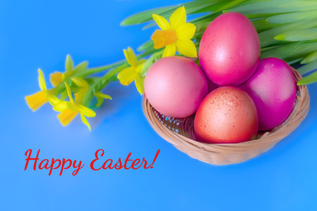 Easter card with red eggs in a wicker basket and daffodil flowers. blue color. Happy Easter. soft...