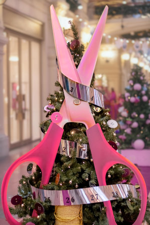 Christmas tree decorated with sewing materials - scissors, thread, measuring tape. Small business. Clothing occupation.の写真素材