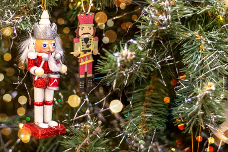 Nutcracker on Christmas tree. Copy space. Postcard.の写真素材