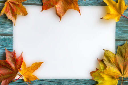 Mockup with fall maple leaves. Autumn frame with space for text.