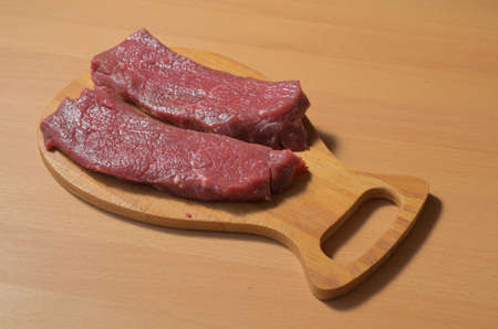 Raw fillet of a young bull for steaks.の写真素材